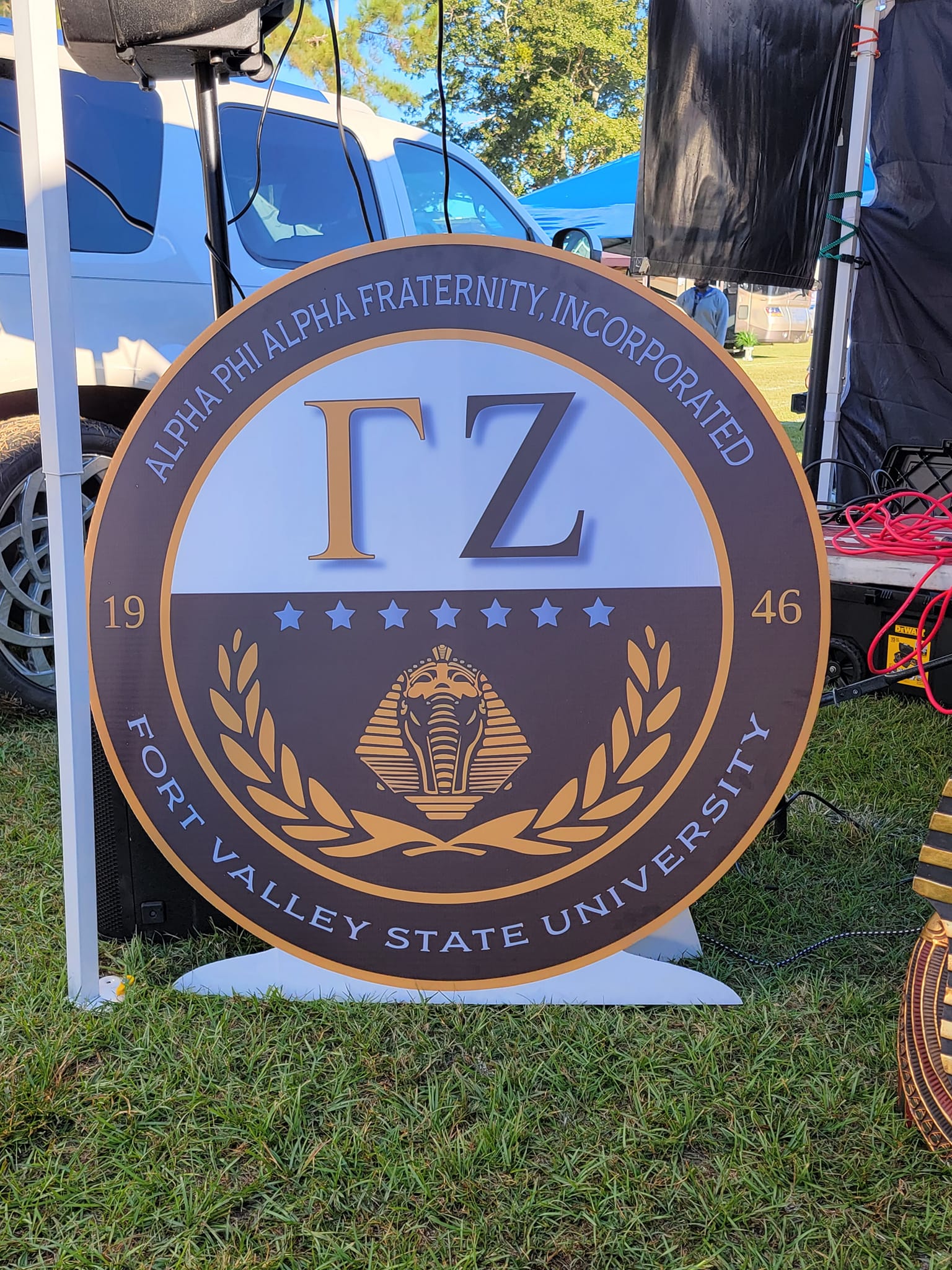 The Gamma Zeta chapter seal sign — Fort Valley State University, established 1946 — on display at the tailgate.